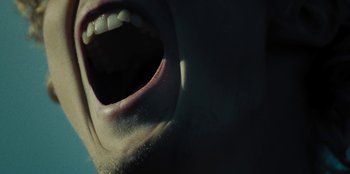 Movie still from “189 - Unfold” (2020), directed by Jonatan Egholm – Extreme Close Up shot, Low angle