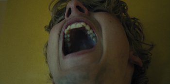 Movie still from “189 - Unfold” (2020), directed by Jonatan Egholm – Extreme Close Up shot, Low angle