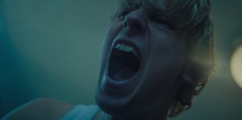 Movie still from “189 - Unfold” (2020), directed by Jonatan Egholm – Extreme Close Up shot, Low angle