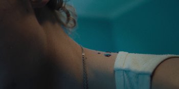 Movie still from “189 - Unfold” (2020), directed by Jonatan Egholm – Extreme Close Up shot, Overhead angle