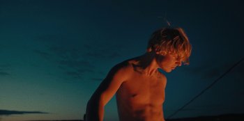 Movie still from “189 - Unfold” (2020), directed by Jonatan Egholm – Medium shot, Low angle