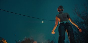 Movie still from “189 - Unfold” (2020), directed by Jonatan Egholm – Medium shot, Low angle