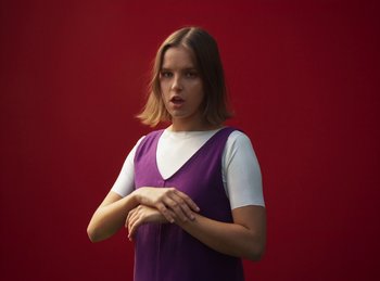 Movie still from “Carlota Flâneur - Generation of the Young Flesh” (2020), directed by Carles Pons Altimira – Medium shot, Low angle