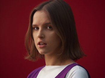 Movie still from “Carlota Flâneur - Generation of the Young Flesh” (2020), directed by Carles Pons Altimira – Close Up shot, Low angle