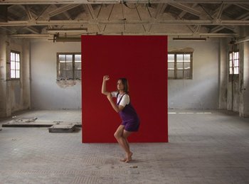 Movie still from “Carlota Flâneur - Generation of the Young Flesh” (2020), directed by Carles Pons Altimira – Wide shot, Low angle