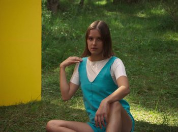 Movie still from “Carlota Flâneur - Generation of the Young Flesh” (2020), directed by Carles Pons Altimira – Medium shot, Low angle