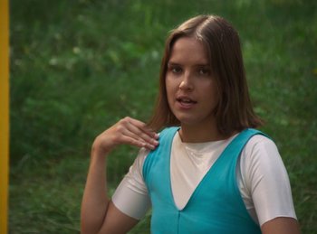 Movie still from “Carlota Flâneur - Generation of the Young Flesh” (2020), directed by Carles Pons Altimira – Close Up shot, Low angle