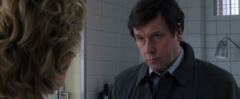 Movie still from “V for Vendetta” (2005), directed by James McTeigue – A man and a woman looking at each other in a bathroom; Close Up shot, Over the shoulder angle