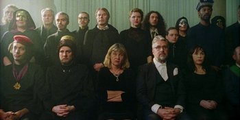 Movie still from “Off The Meds - Karlaplan” (2020), directed by SWIM CLUB – Medium shot, High angle