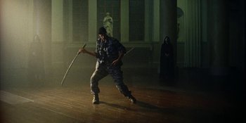 Movie still from “Off The Meds - Karlaplan” (2020), directed by SWIM CLUB – Wide shot, Low angle