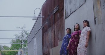 Movie still from “Amanda Sum - Groupthink” (2020), directed by Mayumi Yoshida – Wide shot, Low angle