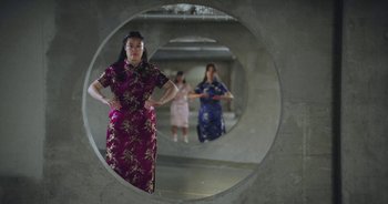 Movie still from “Amanda Sum - Groupthink” (2020), directed by Mayumi Yoshida – Wide shot, Low angle