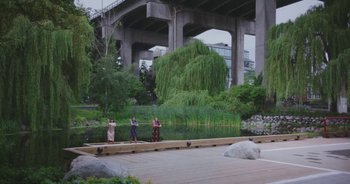 Movie still from “Amanda Sum - Groupthink” (2020), directed by Mayumi Yoshida – Extreme Wide shot, Low angle