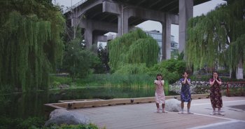 Movie still from “Amanda Sum - Groupthink” (2020), directed by Mayumi Yoshida – Extreme Wide shot, Low angle