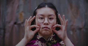 Movie still from “Amanda Sum - Groupthink” (2020), directed by Mayumi Yoshida – Close Up shot, Low angle