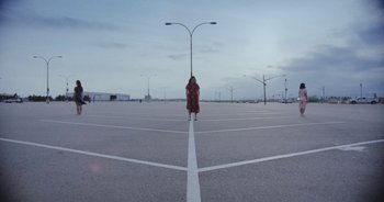 Movie still from “Amanda Sum - Groupthink” (2020), directed by Mayumi Yoshida – Extreme Wide shot, Low angle
