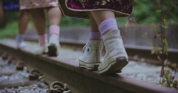 Movie still from “Amanda Sum - Groupthink” (2020), directed by Mayumi Yoshida – Extreme Close Up shot, Low angle