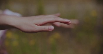 Movie still from “Amanda Sum - Groupthink” (2020), directed by Mayumi Yoshida – Extreme Close Up shot, Low angle