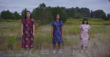 Movie still from “Amanda Sum - Groupthink” (2020), directed by Mayumi Yoshida – Wide shot, Low angle