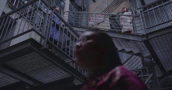 Movie still from “Amanda Sum - Groupthink” (2020), directed by Mayumi Yoshida – Extreme Wide shot, Low angle