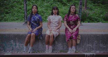 Movie still from “Amanda Sum - Groupthink” (2020), directed by Mayumi Yoshida – Wide shot, Low angle