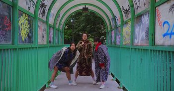 Movie still from “Amanda Sum - Groupthink” (2020), directed by Mayumi Yoshida – Wide shot, Low angle