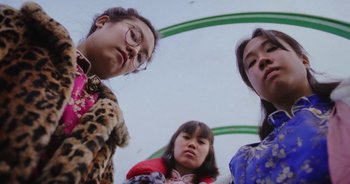 Movie still from “Amanda Sum - Groupthink” (2020), directed by Mayumi Yoshida – Close Up shot, Low angle