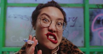 Movie still from “Amanda Sum - Groupthink” (2020), directed by Mayumi Yoshida – Extreme Close Up shot, Low angle