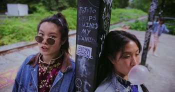 Movie still from “Amanda Sum - Groupthink” (2020), directed by Mayumi Yoshida – Close Up shot, Low angle