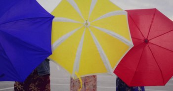 Movie still from “Amanda Sum - Groupthink” (2020), directed by Mayumi Yoshida – Medium shot, Overhead angle