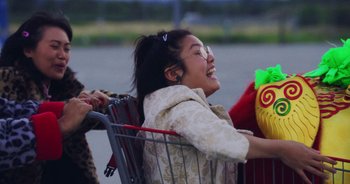 Movie still from “Amanda Sum - Groupthink” (2020), directed by Mayumi Yoshida – Medium shot, Over the shoulder angle