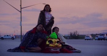 Movie still from “Amanda Sum - Groupthink” (2020), directed by Mayumi Yoshida – Wide shot, Low angle