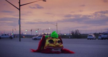 Movie still from “Amanda Sum - Groupthink” (2020), directed by Mayumi Yoshida – Extreme Close Up shot, Low angle