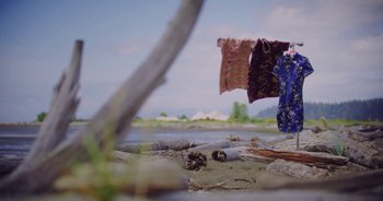 Movie still from “Amanda Sum - Groupthink” (2020), directed by Mayumi Yoshida – Wide shot, Low angle