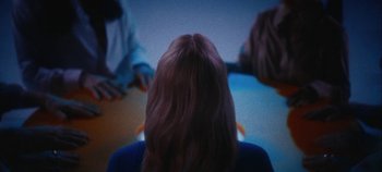 Movie still from “Agnes - Fingers Crossed” (2020), directed by SWIM CLUB – Medium shot, High angle