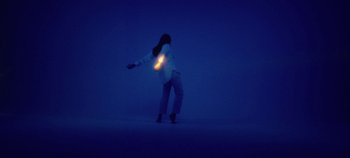 Movie still from “Agnes - Fingers Crossed” (2020), directed by SWIM CLUB – Medium shot, Low angle