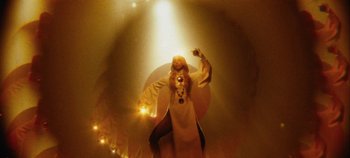 Movie still from “Agnes - Fingers Crossed” (2020), directed by SWIM CLUB – Medium shot, Low angle