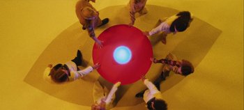 Movie still from “Agnes - Fingers Crossed” (2020), directed by SWIM CLUB – Extreme Wide shot, Overhead angle