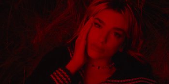 Movie still from “Dua Lipa - Levitating feat. Madonna & Missy Elliott” (2020), directed by Will Hooper – Close Up shot, Overhead angle