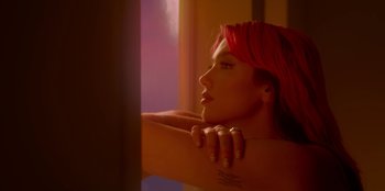 Movie still from “Dua Lipa - Levitating feat. Madonna & Missy Elliott” (2020), directed by Will Hooper – Close Up shot, Low angle