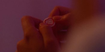 Movie still from “Dua Lipa - Levitating feat. Madonna & Missy Elliott” (2020), directed by Will Hooper – Extreme Close Up shot, Overhead angle