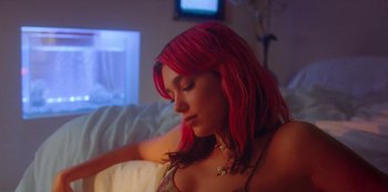 Movie still from “Dua Lipa - Levitating feat. Madonna & Missy Elliott” (2020), directed by Will Hooper – Medium shot, Low angle