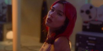 Movie still from “Dua Lipa - Levitating feat. Madonna & Missy Elliott” (2020), directed by Will Hooper – Close Up shot, Low angle