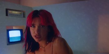 Movie still from “Dua Lipa - Levitating feat. Madonna & Missy Elliott” (2020), directed by Will Hooper – Close Up shot, Low angle