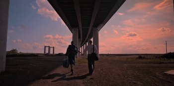 Movie still from “Dua Lipa - Levitating feat. Madonna & Missy Elliott” (2020), directed by Will Hooper – Wide shot, Low angle