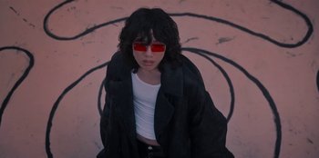 Movie still from “Dua Lipa - Levitating feat. Madonna & Missy Elliott” (2020), directed by Will Hooper – Medium shot, Low angle