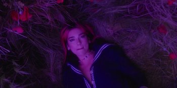 Movie still from “Dua Lipa - Levitating feat. Madonna & Missy Elliott” (2020), directed by Will Hooper – Medium shot, High angle