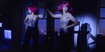 Movie still from “Dua Lipa - Levitating feat. Madonna & Missy Elliott” (2020), directed by Will Hooper – Medium shot, Low angle