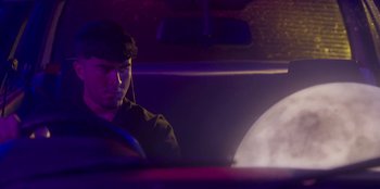 Movie still from “Dua Lipa - Levitating feat. Madonna & Missy Elliott” (2020), directed by Will Hooper – Medium shot, Low angle