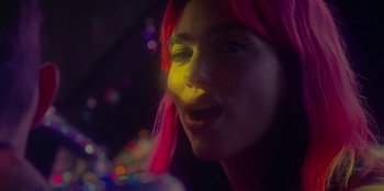 Movie still from “Dua Lipa - Levitating feat. Madonna & Missy Elliott” (2020), directed by Will Hooper – Extreme Close Up shot, Low angle